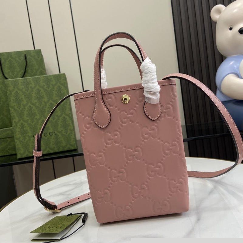 G*u*i top handle bags